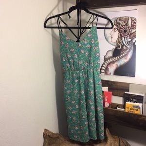 Green mini strappy dress with purple floral
